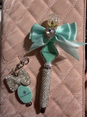 Teal and silver stylus pen and matching phone charm.
